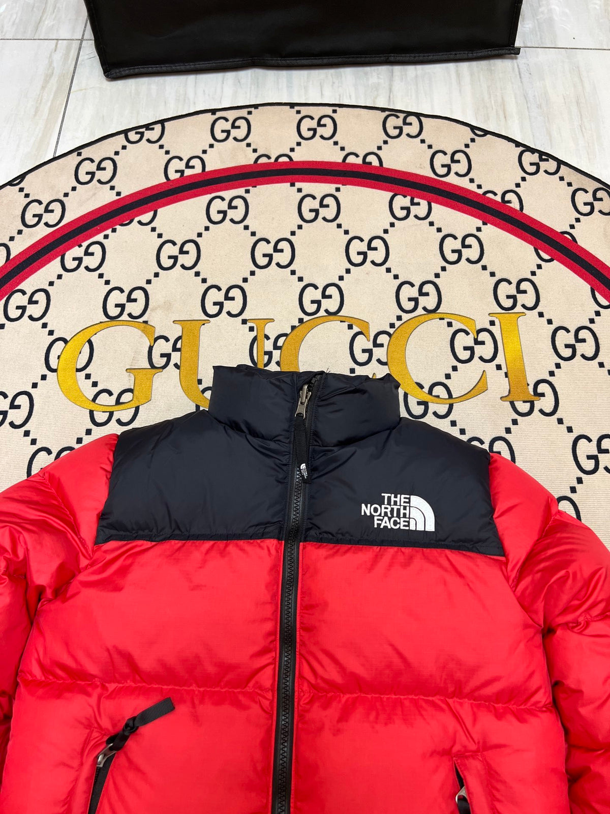 The North Face Red and Black Colorblock Stand Collar Puffer Jacket