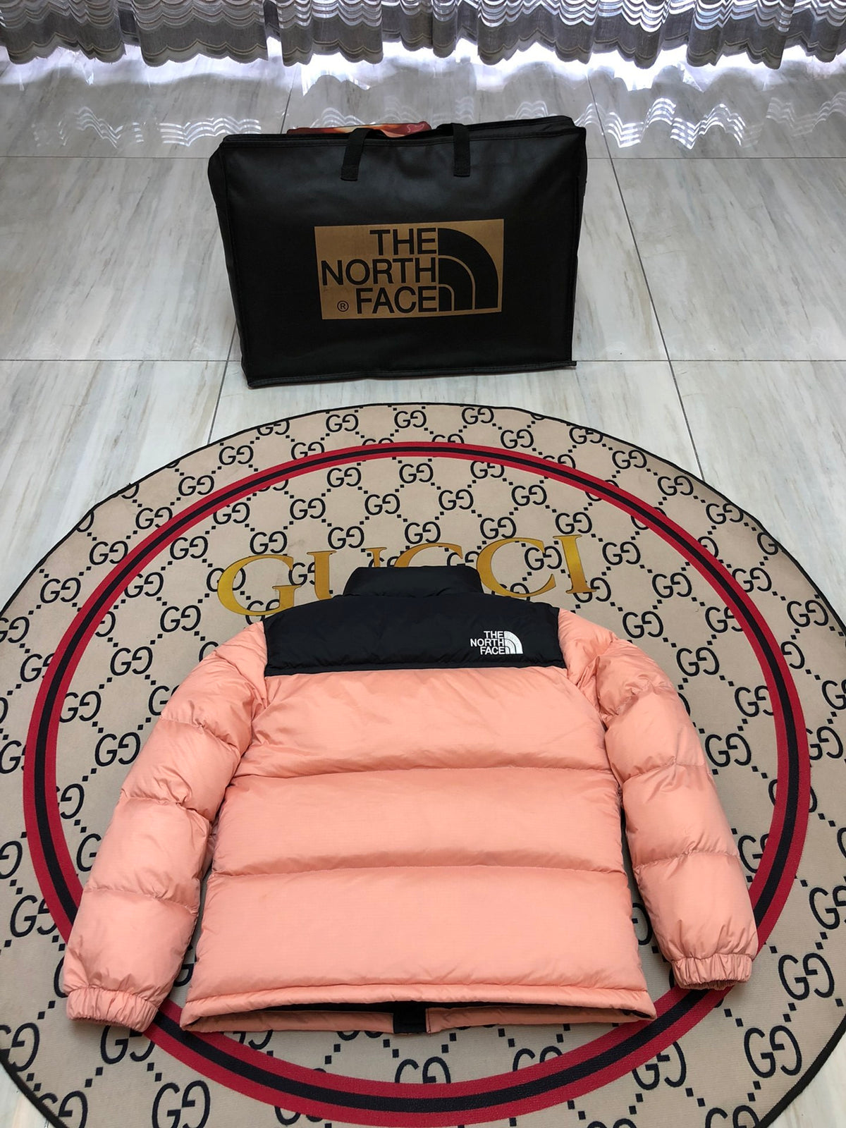 The North Face Peach Pink and Black Colorblock Stand Collar Puffer Jacket