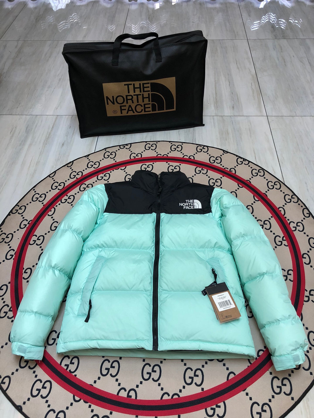 The North Face Mint Green and Black Colorblock Stand Collar Puffer Jacket