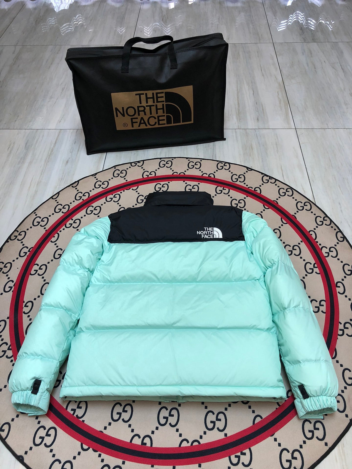 The North Face Mint Green and Black Colorblock Stand Collar Puffer Jacket