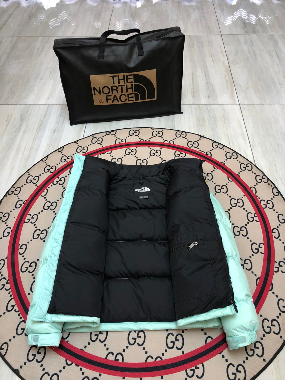 The North Face Mint Green and Black Colorblock Stand Collar Puffer Jacket