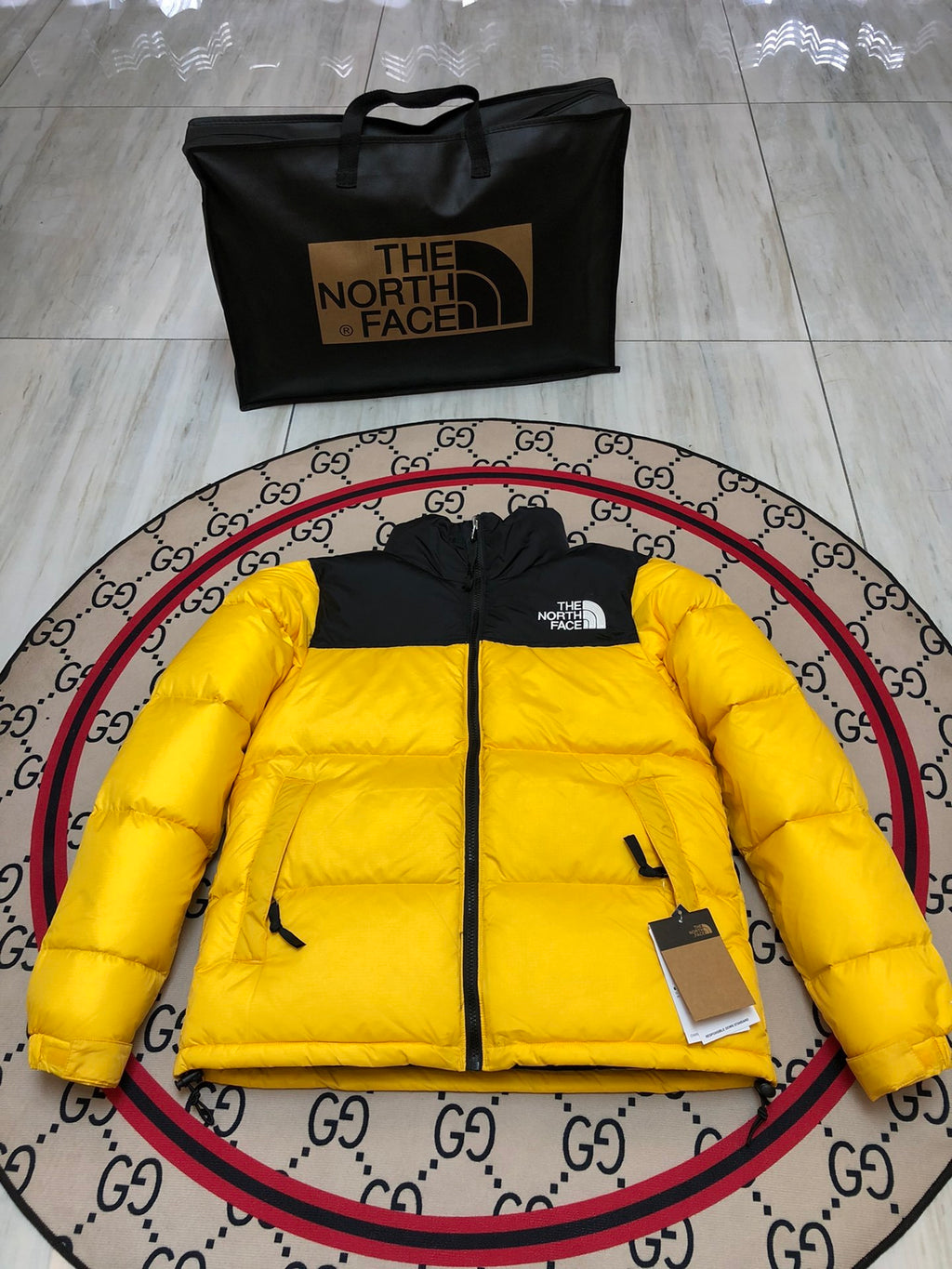 The North Face Yellow and Black Colorblock Stand Collar Puffer Jacket