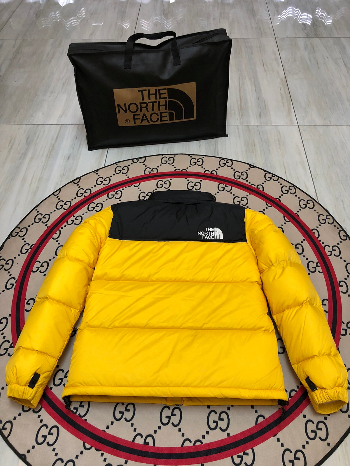 The North Face Yellow and Black Colorblock Stand Collar Puffer Jacket