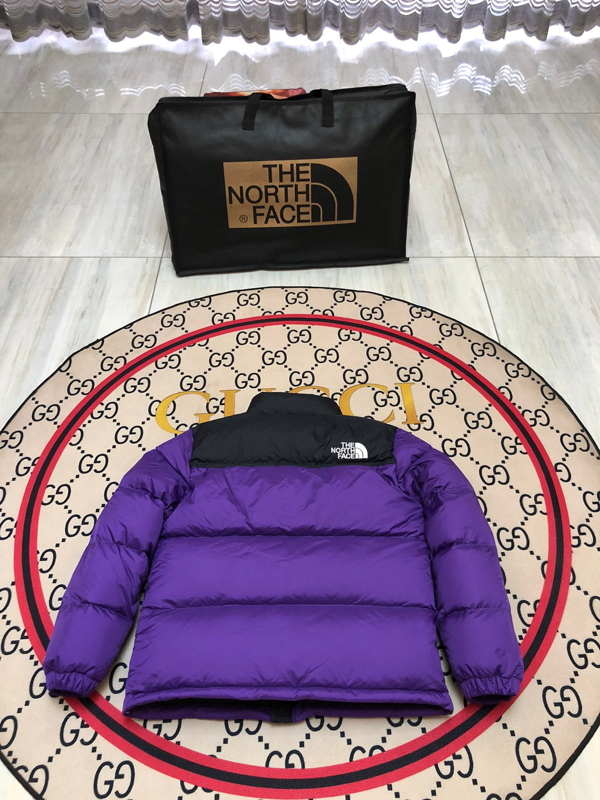 The North Face Purple and Black Colorblock Stand Collar Puffer Jacket