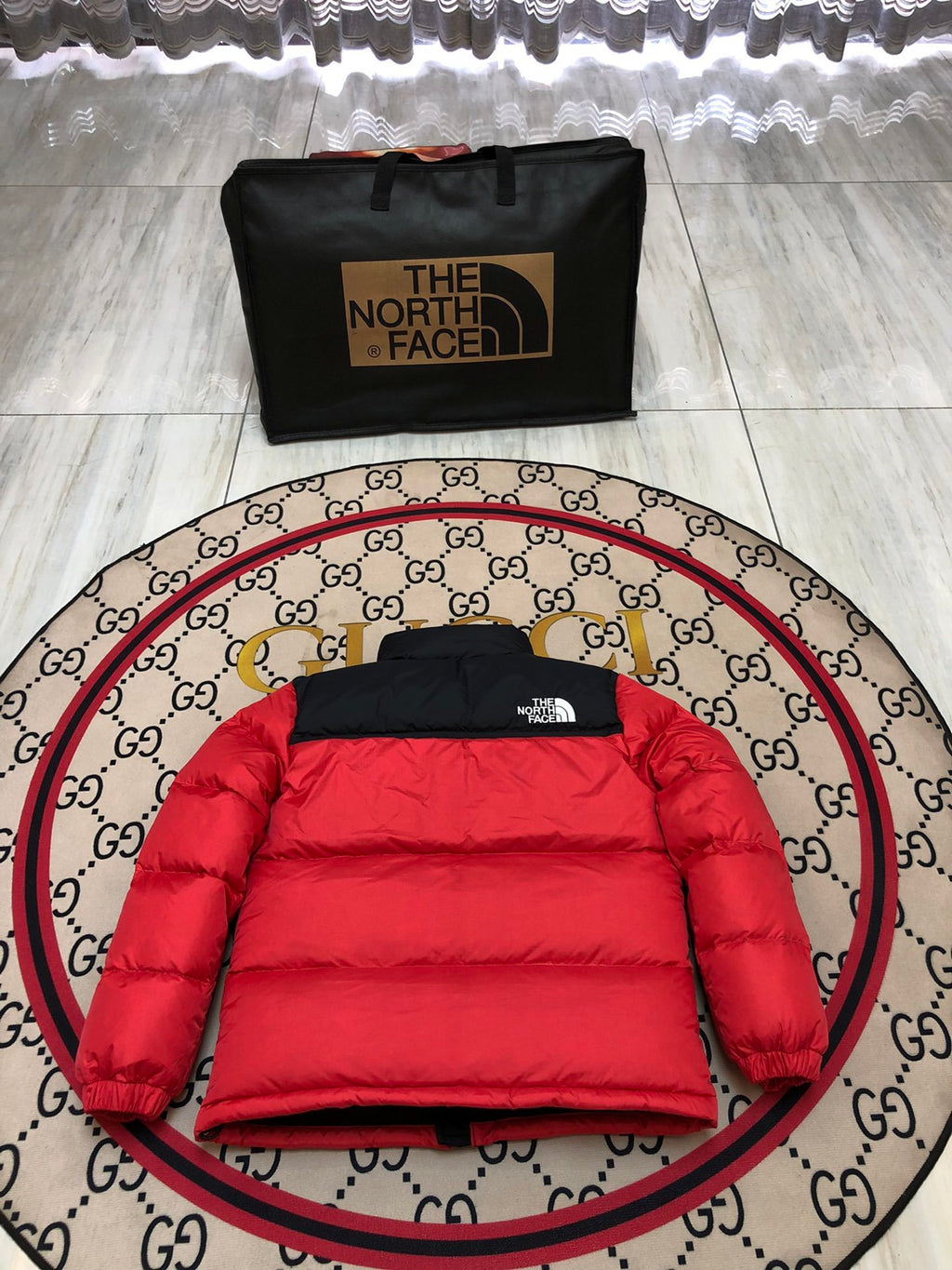 The North Face Red and Black Colorblock Stand Collar Puffer Jacket