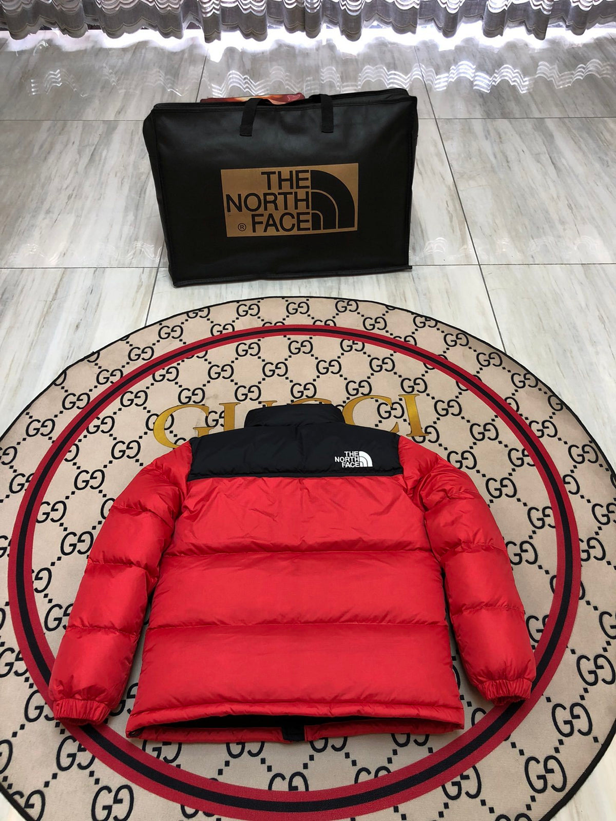 The North Face Red and Black Colorblock Stand Collar Puffer Jacket
