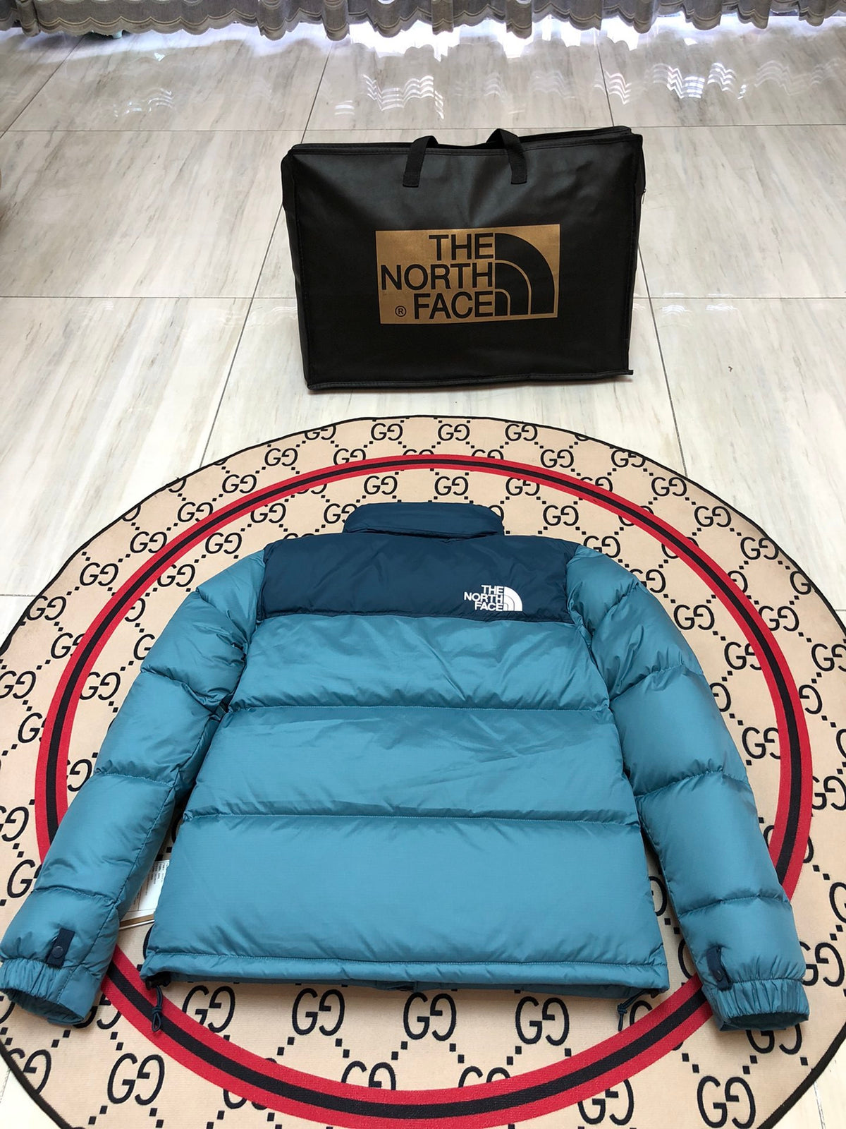 The North Face Teal Blue and Navy Colorblock Stand Collar Puffer Jacket