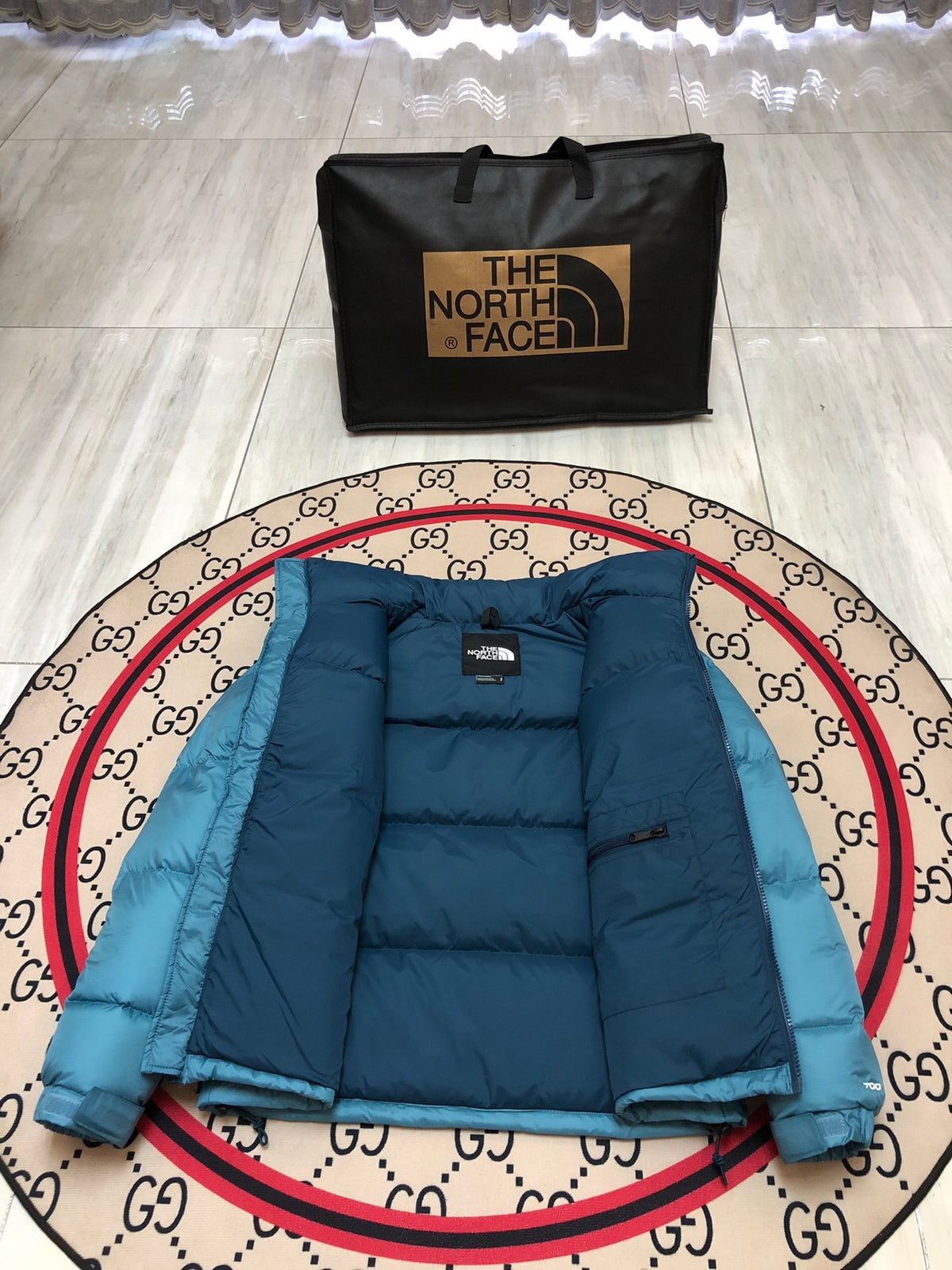 The North Face Teal Blue and Navy Colorblock Stand Collar Puffer Jacket