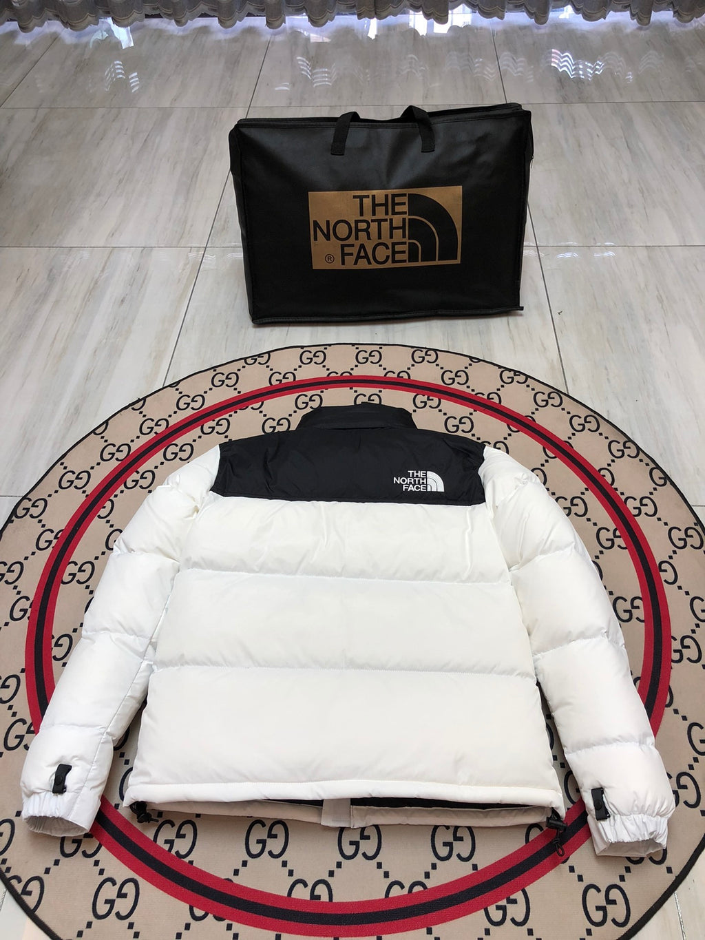 The North Face White and Black Colorblock Stand Collar Puffer Jacket