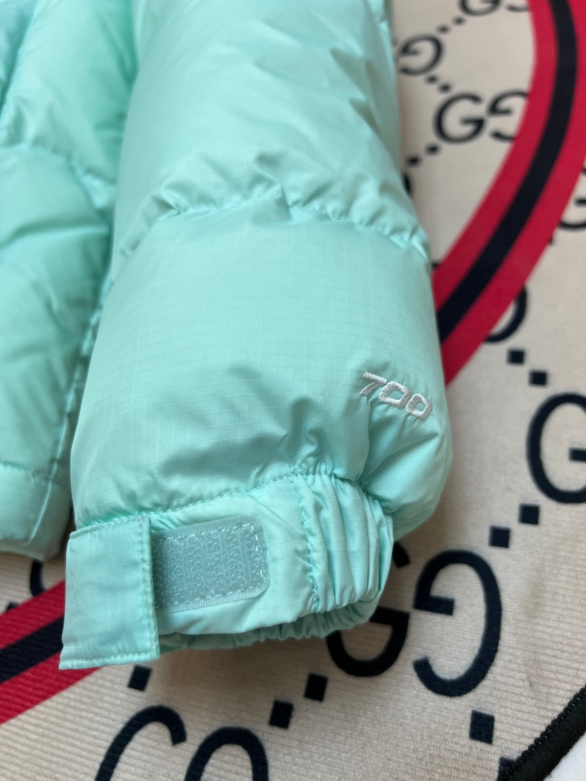 The North Face Mint Green and Black Colorblock Stand Collar Puffer Jacket