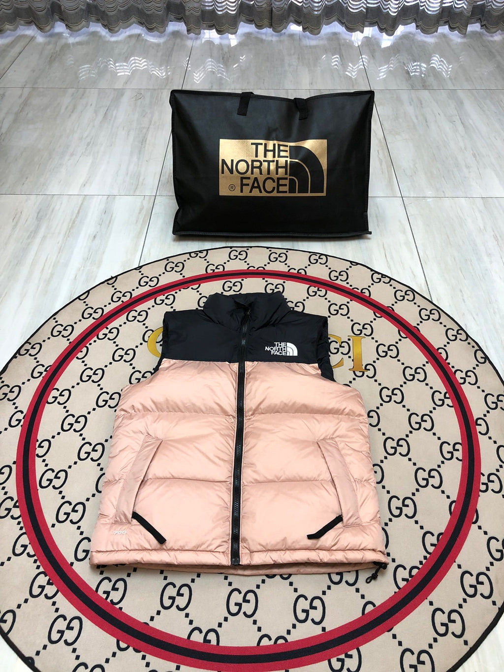 The North Face Blush Pink and Black Colorblock Puffer Vest