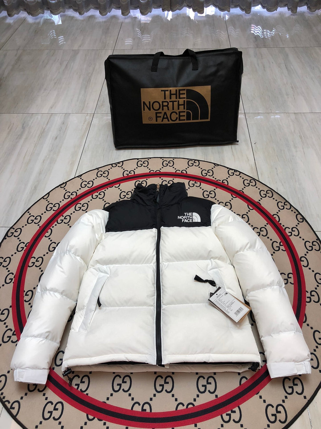 The North Face White and Black Colorblock Stand Collar Puffer Jacket