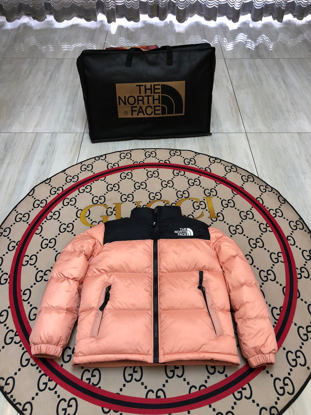 The North Face Peach Pink and Black Colorblock Stand Collar Puffer Jacket