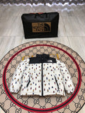 The North Face White and Black Bear Print Stand Collar Puffer Jacket