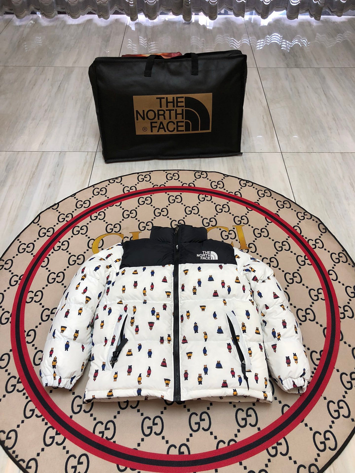 The North Face White and Black Bear Print Stand Collar Puffer Jacket