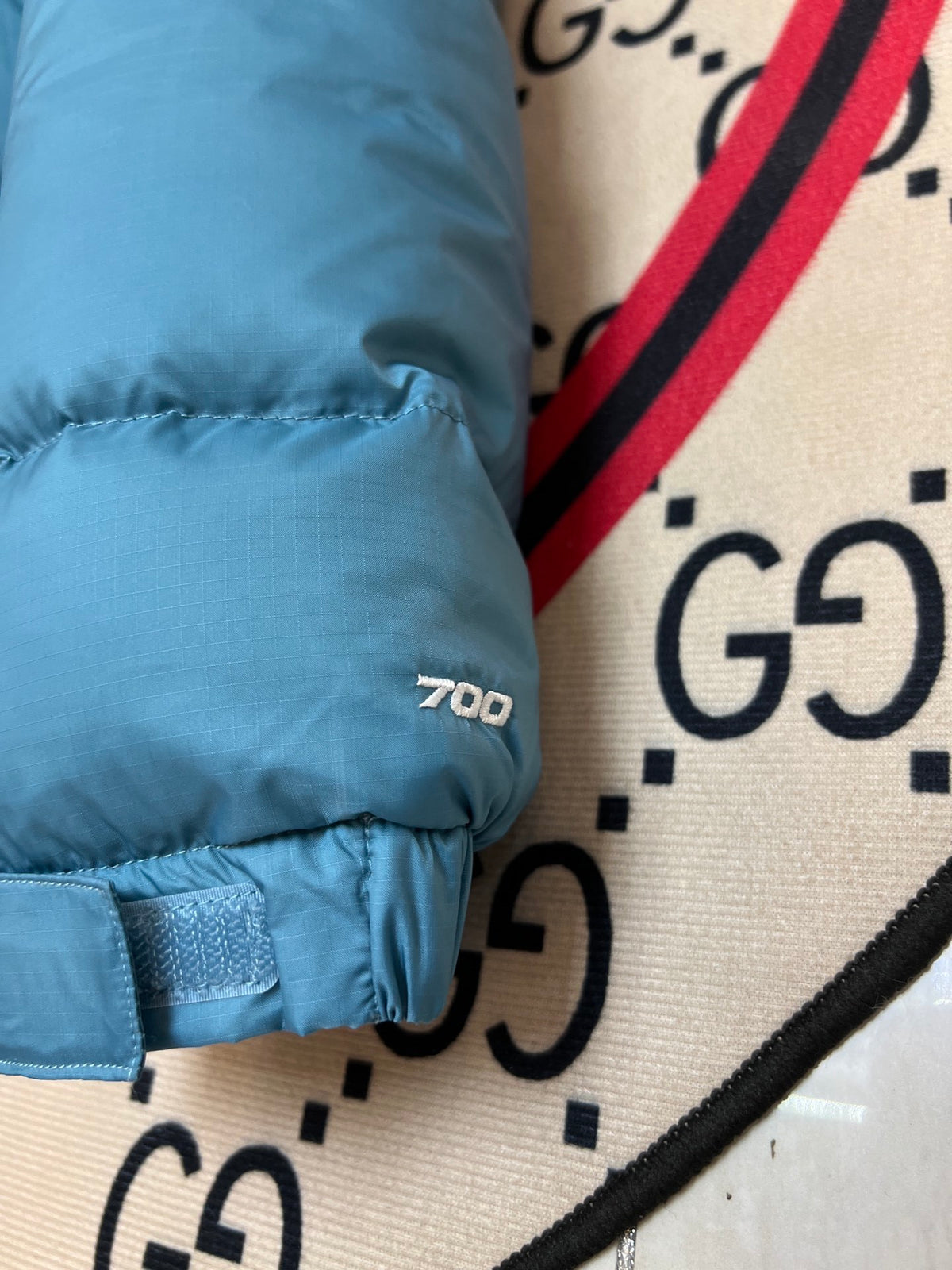 The North Face Teal Blue and Navy Colorblock Stand Collar Puffer Jacket