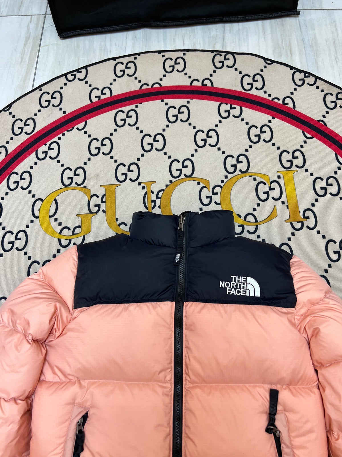 The North Face Peach Pink and Black Colorblock Stand Collar Puffer Jacket