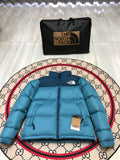 The North Face Teal Blue and Navy Colorblock Stand Collar Puffer Jacket