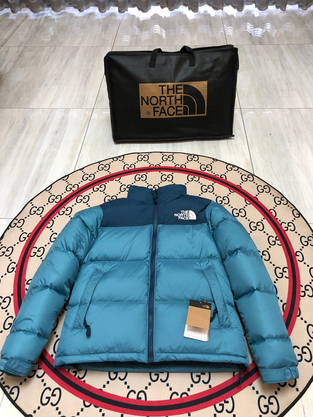 The North Face Teal Blue and Navy Colorblock Stand Collar Puffer Jacket